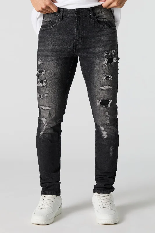 Men's Distressed Jeans with Patches for a Retro and DIY - Inspired AppearanceBlack Vintage Wash Distressed Skinny Jean