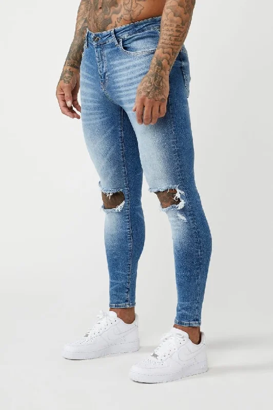 Men's Jeans with an Elastic Waistband for Ultimate ComfortPREMIUM SKINNY FIT JEANS DESTROYED KNEE - MID BLUE WASH