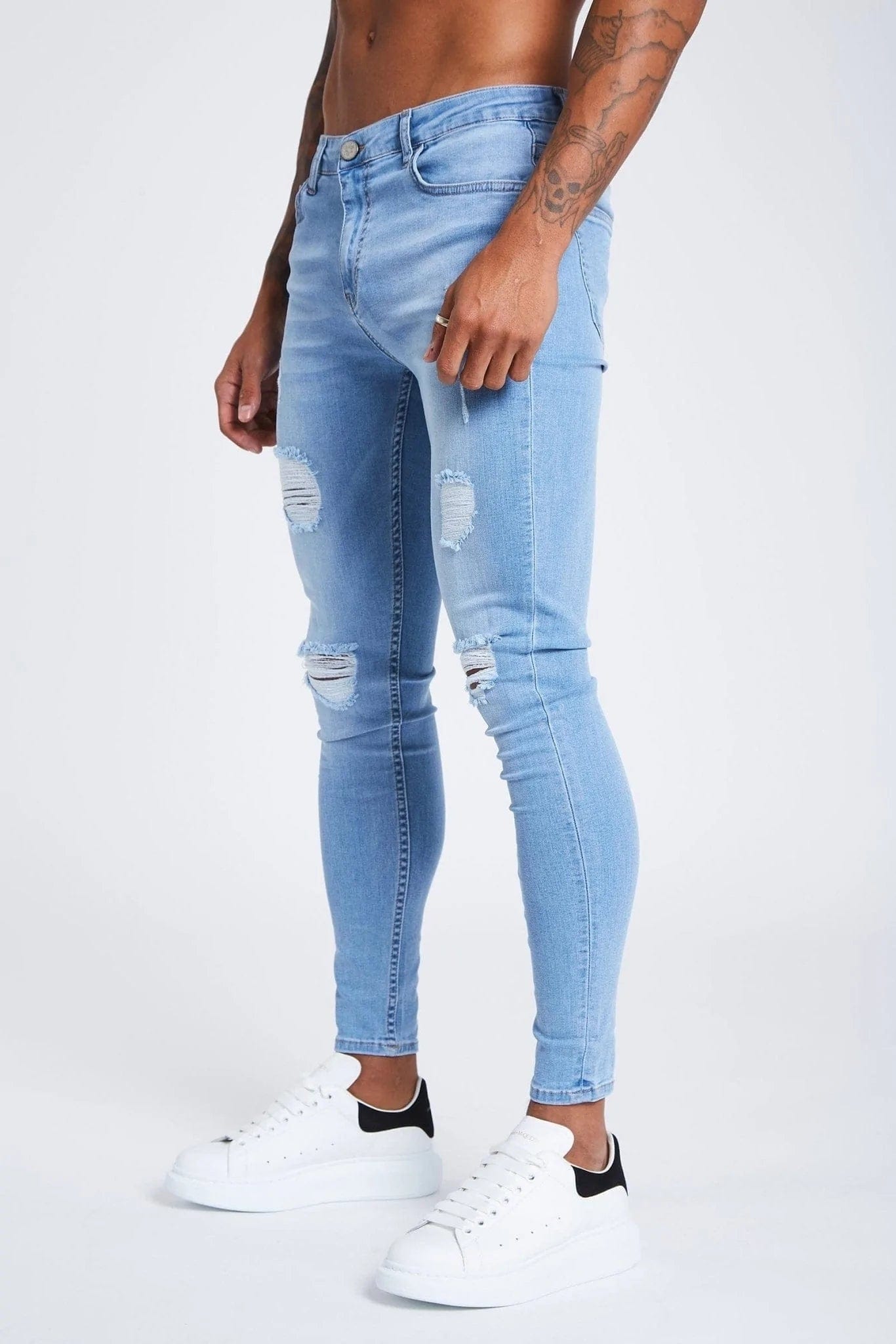 Men's Colored Jeans in Burgundy for a Bold and Fashion - Forward LookSKINNY FIT JEANS RIPPED AND REPAIRED - LIGHT BLUE