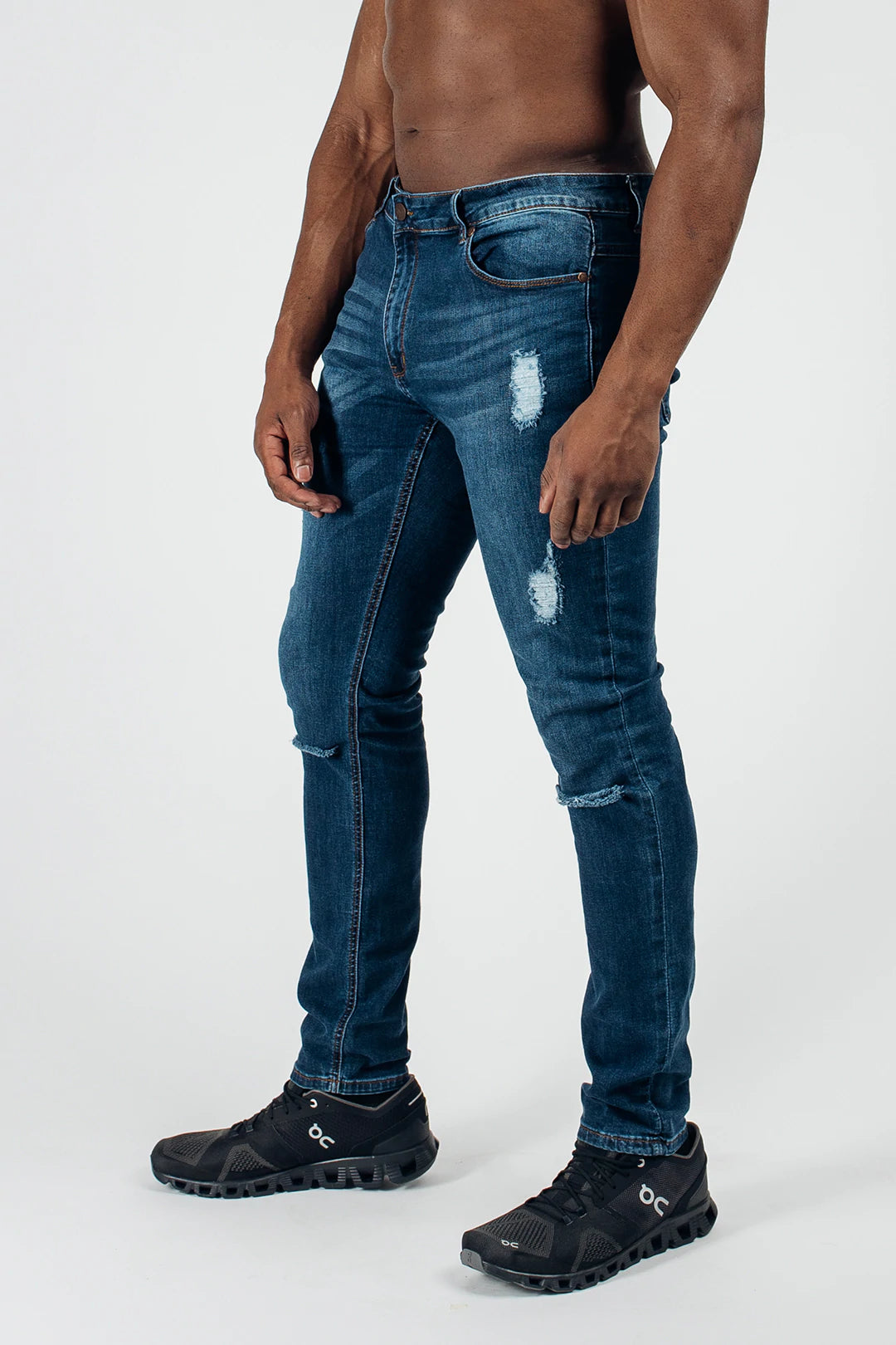 Men's Distressed Jeans with Patches for a Retro and DIY - Inspired AppearanceSlim Athletic Fit Destroyed Jeans