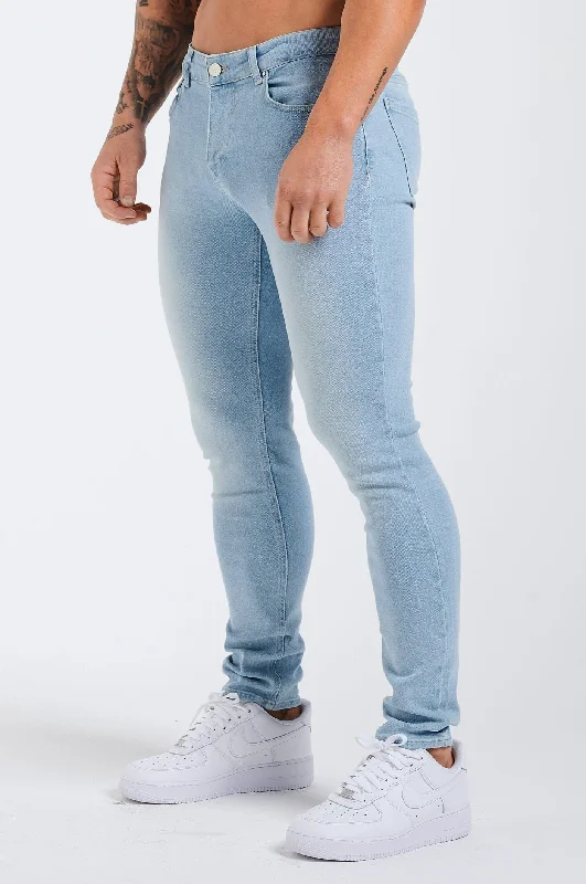Men's Distressed Jeans with Patches for a Retro and DIY - Inspired AppearanceSLIM FIT JEANS 2.0 - PALE LIGHT BLUE