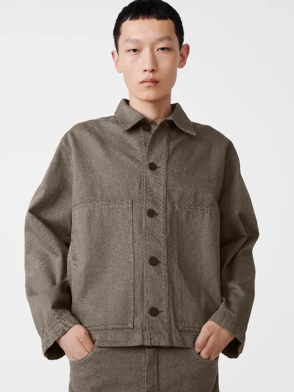 Men's Distressed Jeans with Patches for a Retro and DIY - Inspired AppearanceGraph Denim Jacket in Fossil
