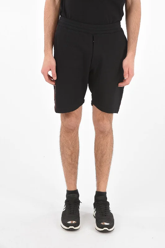 Plus Size Men's Beach Shorts in Orange with a Floral Pattern for a Vibrant Summer LookAlexander McQueen Side Logo Band Jersey Shorts Plus Size Men's Beach Shorts in Orange with a Floral Pattern for a Vibrant Summer LookAlexander McQueen Side Logo Band Jersey Shorts