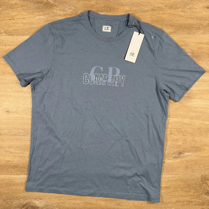 Men's short - sleeve linen t - shirts for summer beach outingsC.P. Company Graphic Logo T-Shirt in Infinity Blue Men's short - sleeve linen t - shirts for summer beach outingsC.P. Company Graphic Logo T-Shirt in Infinity Blue